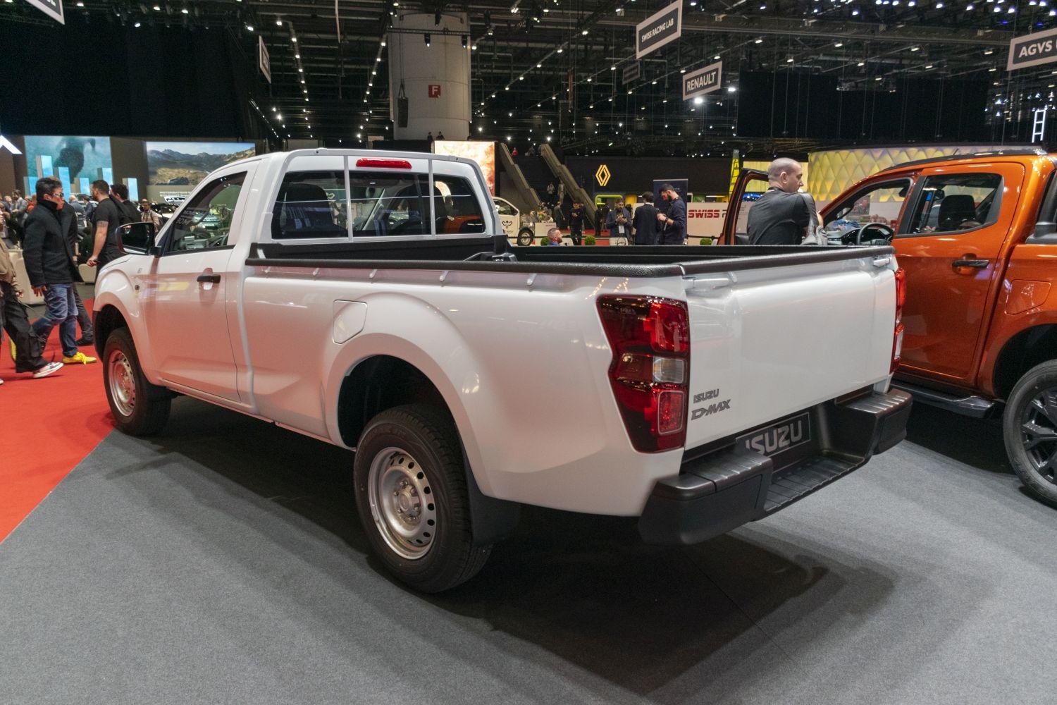 Rear and side view of single cab pickup with cargo bed and steel wheels