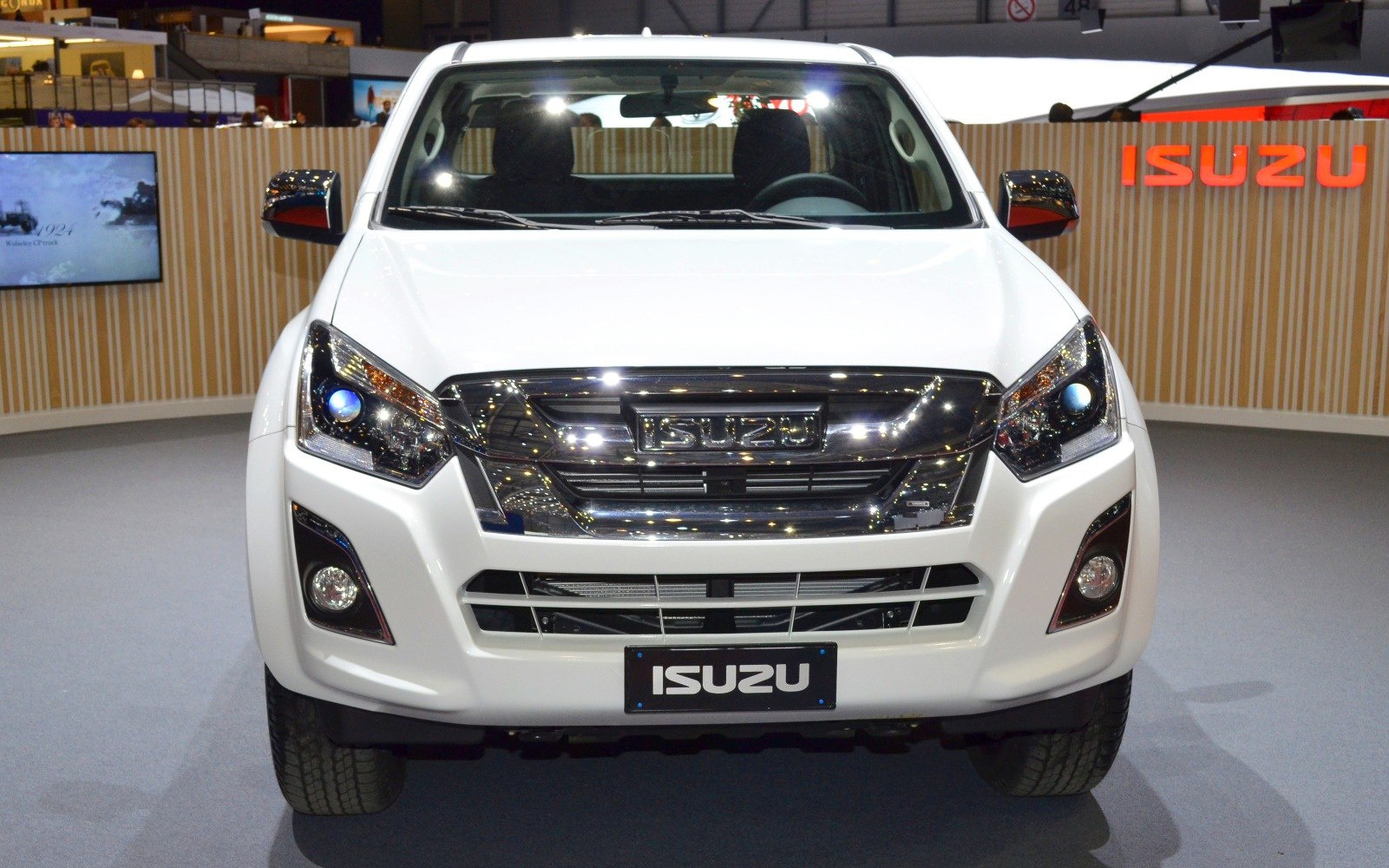 Front view showing chrome grille and LED headlights of a pickup truck.
