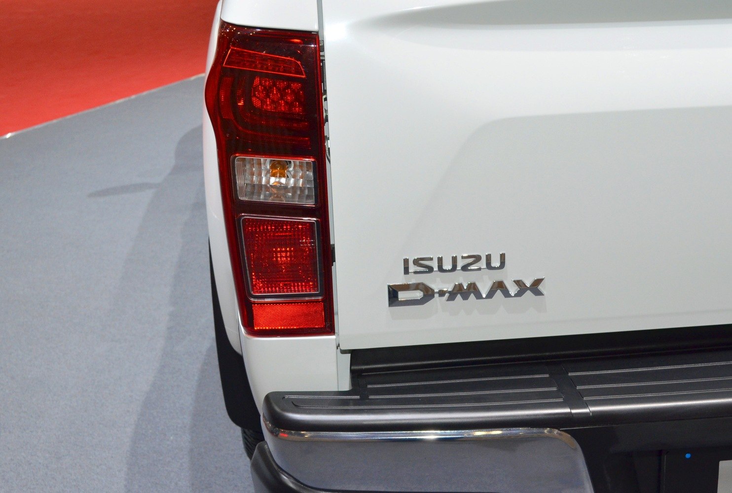 Close-up of rear light and badge on pickup rear