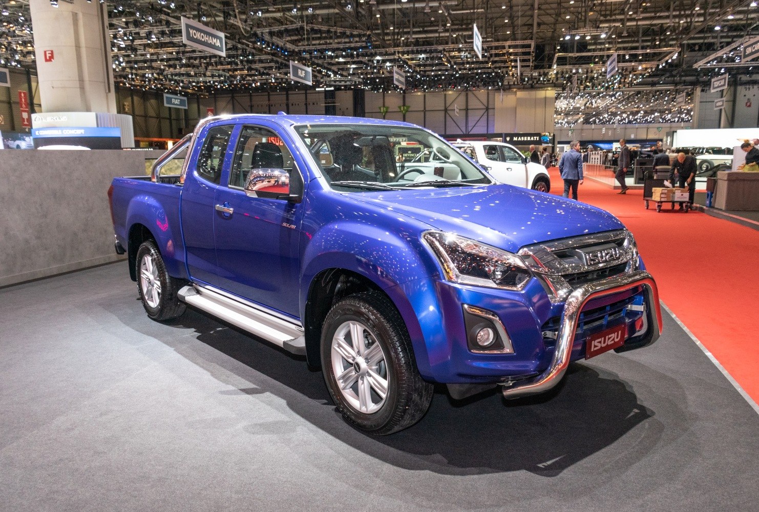 Blue pickup with chrome bull bar and alloy wheels