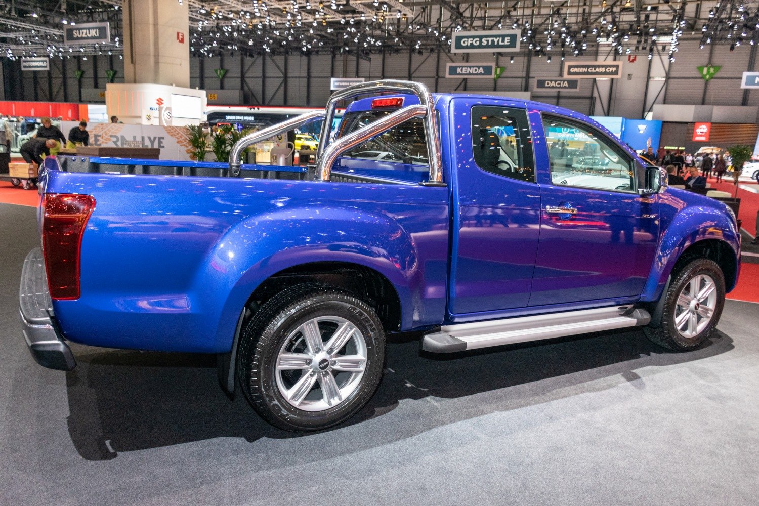 Blue pickup truck side view with chrome sport bar