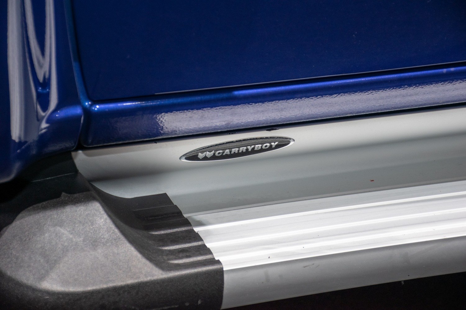 Close-up of side step with Carryboy badge