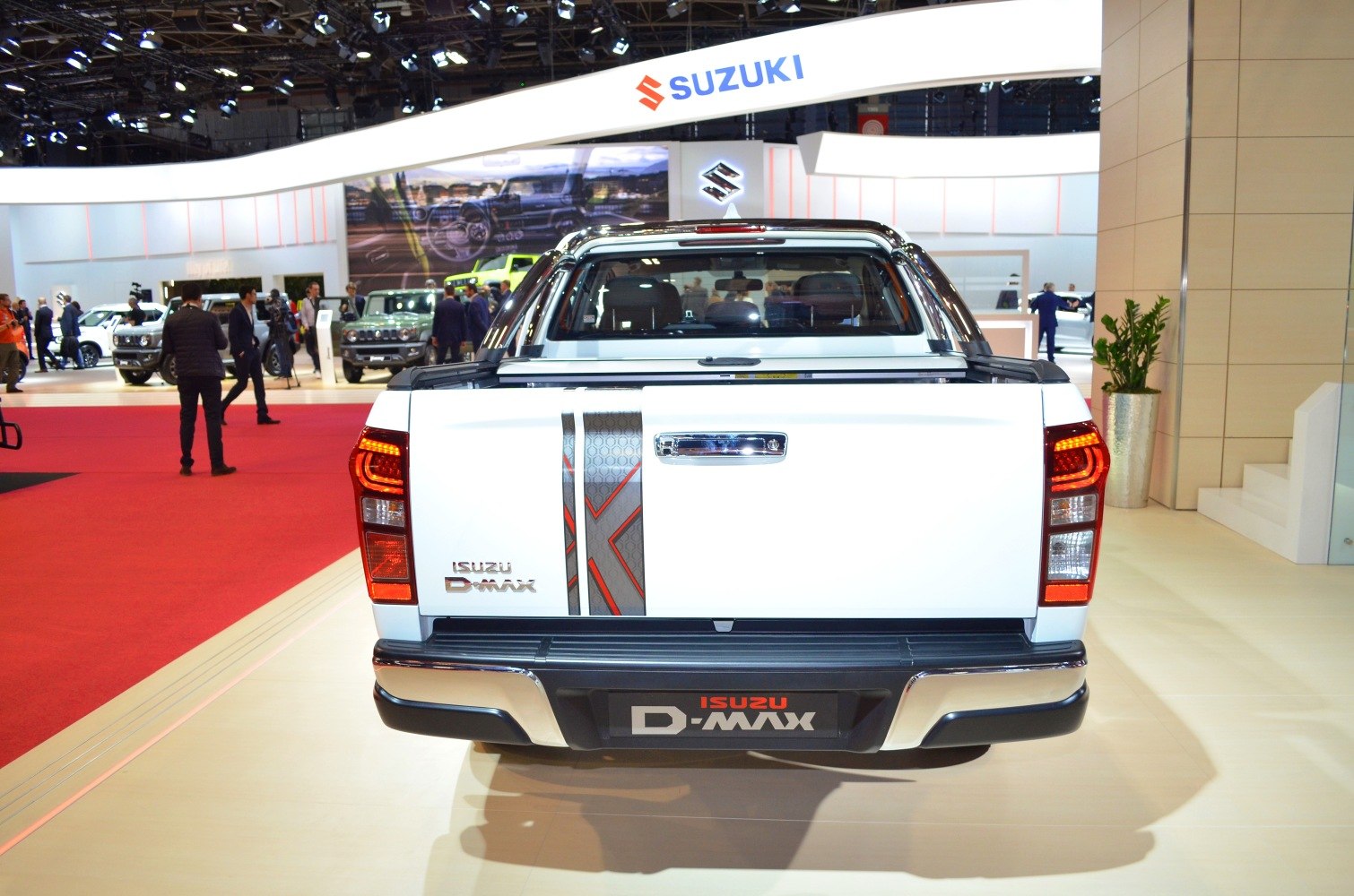 Rear view of pickup truck with unique tail lights and tailgate decal