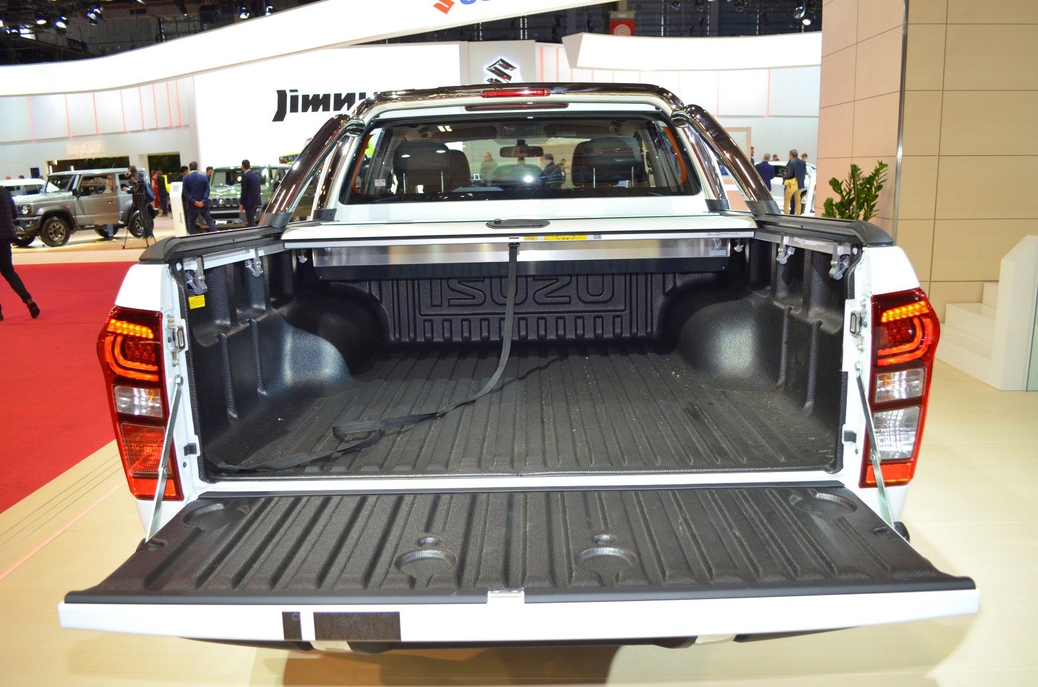 Open pickup bed with tailgate and black bed liner