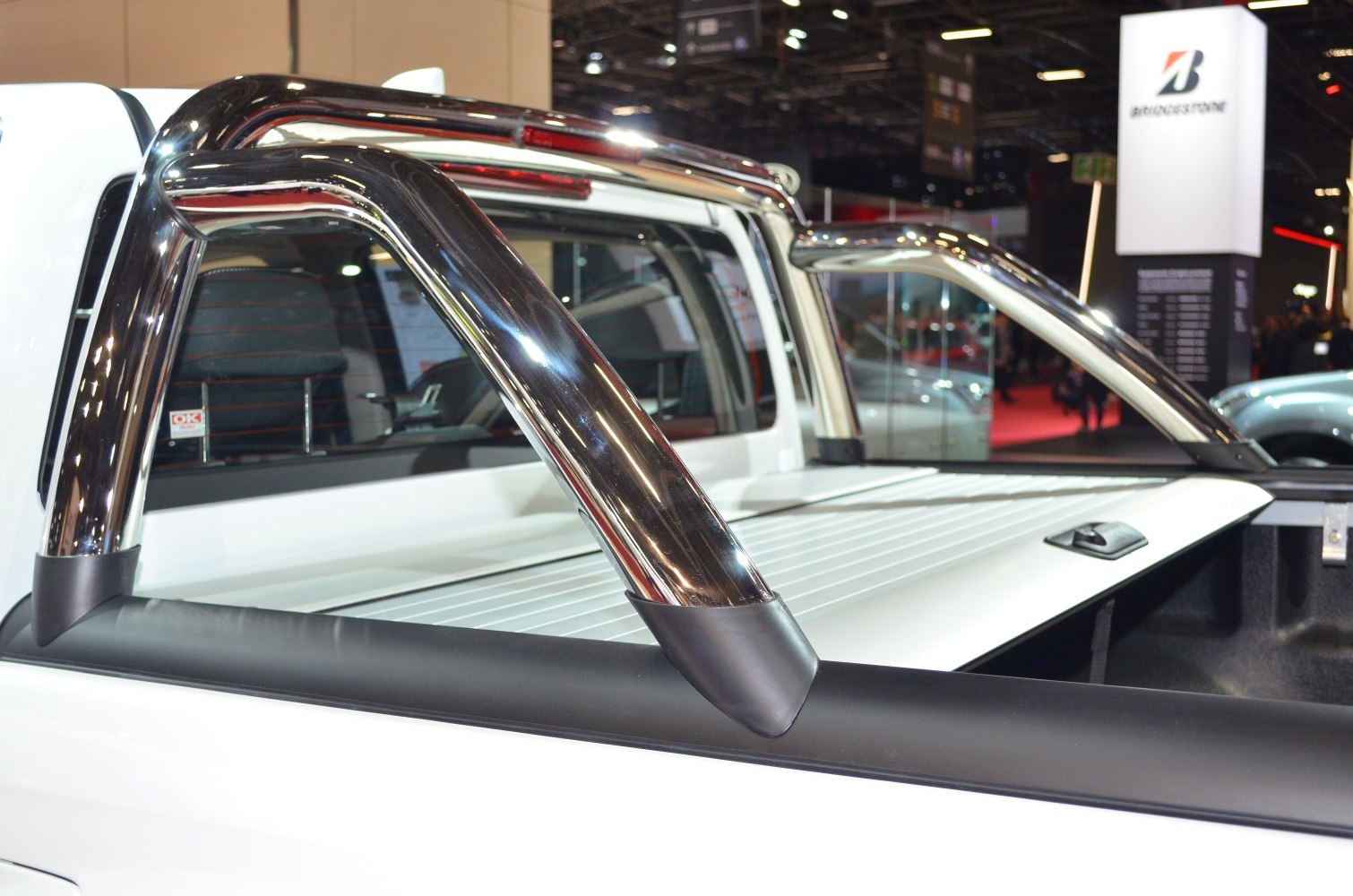 Chrome roll bar and retractable pickup bed cover