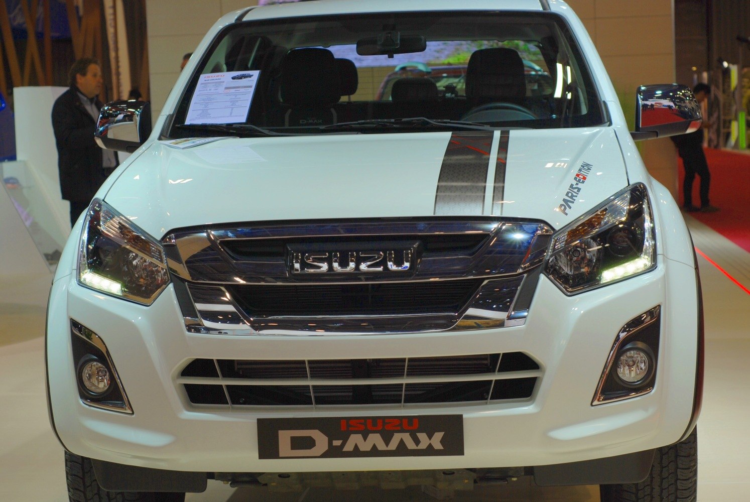 Front grille and LED headlights of a modern pickup