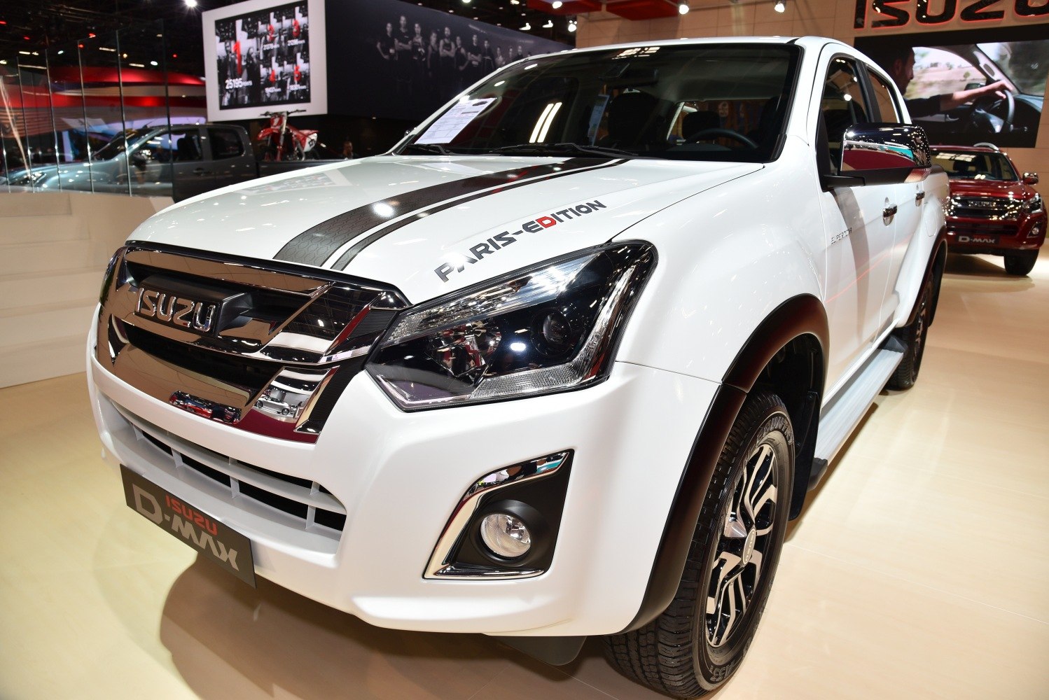 Close-up of front grille, headlights, and hood graphic on pickup truck