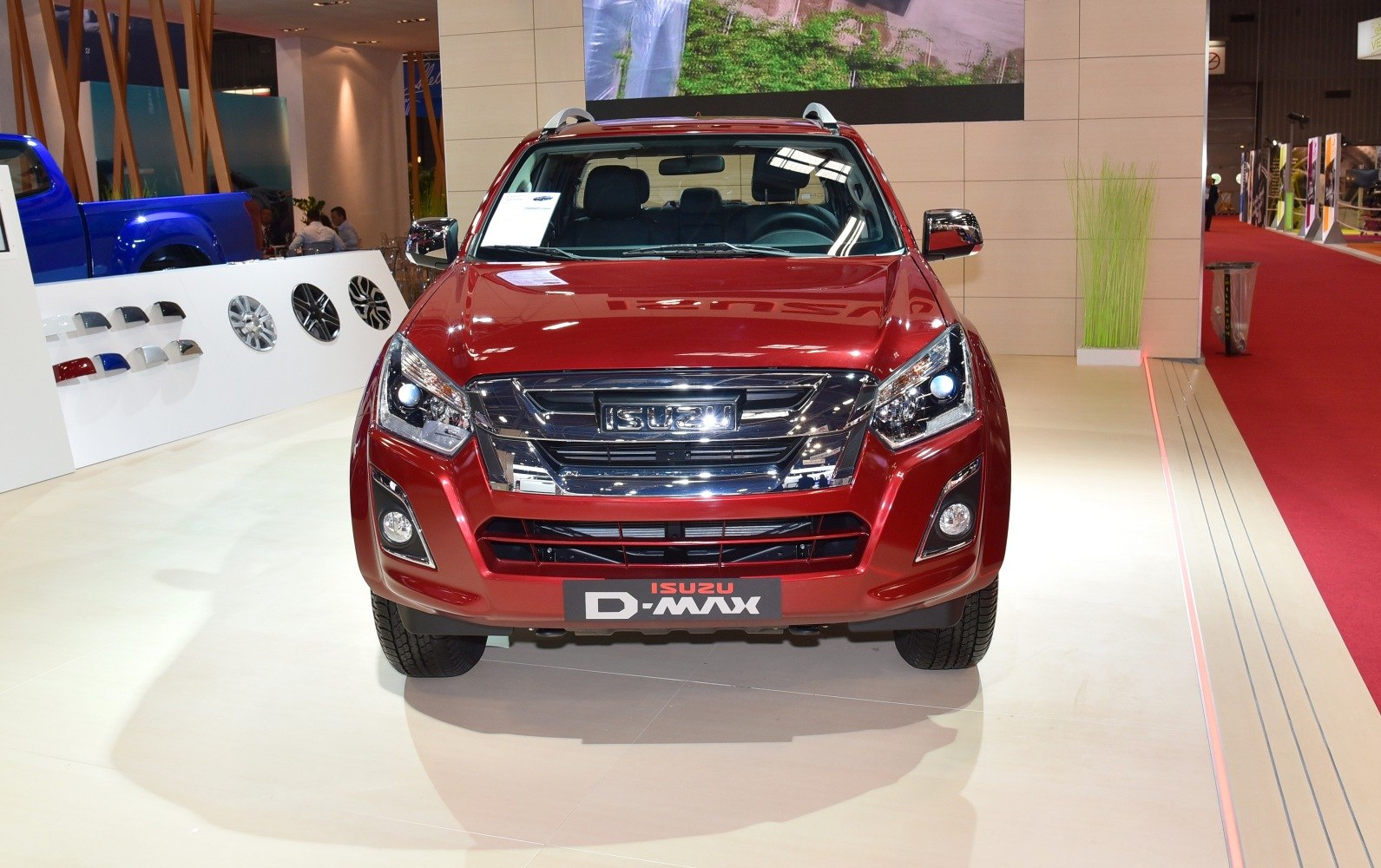 Front view of pickup with chrome grille, LED headlights, and fog lights