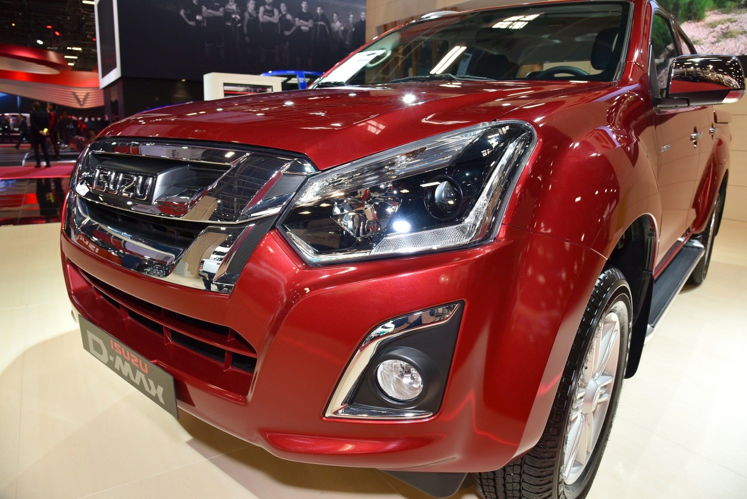 Front end with chrome grille, sharp headlights, and fog light
