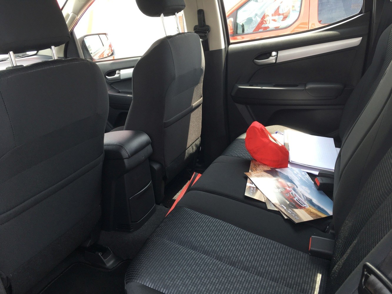 Rear seat and cabin interior with black fabric upholstery