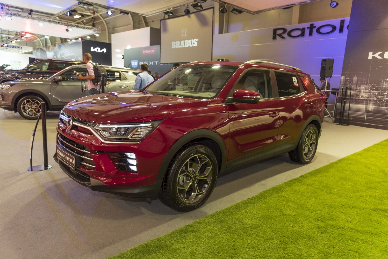 Front and side view of a modern SUV with stylish headlights and alloy wheels