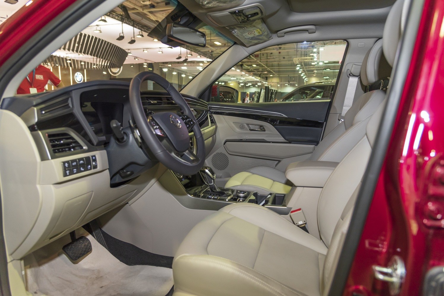 Luxurious ergonomic seats and modern dashboard with controls.
