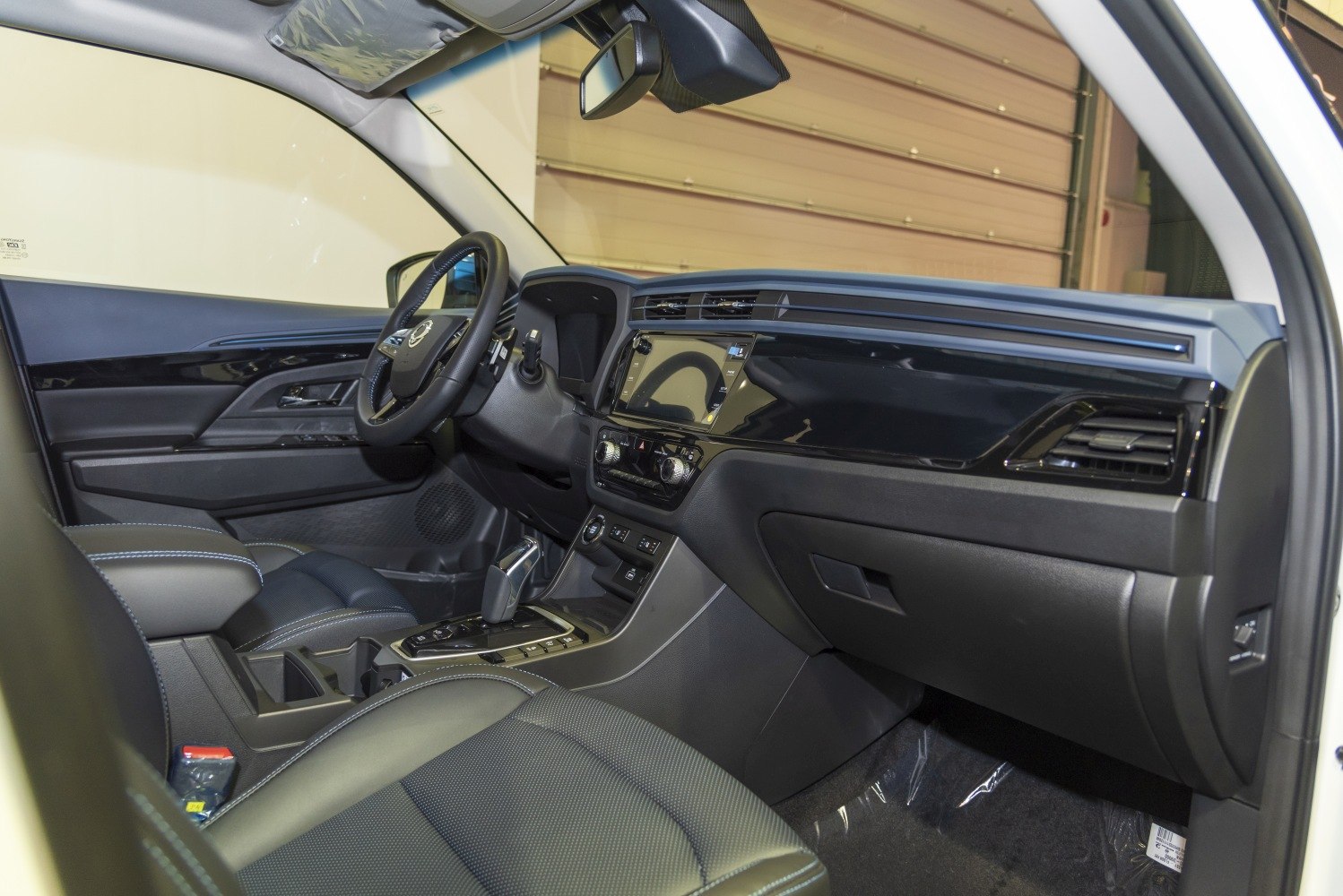 Modern SUV interior with touchscreen infotainment and ergonomic layout