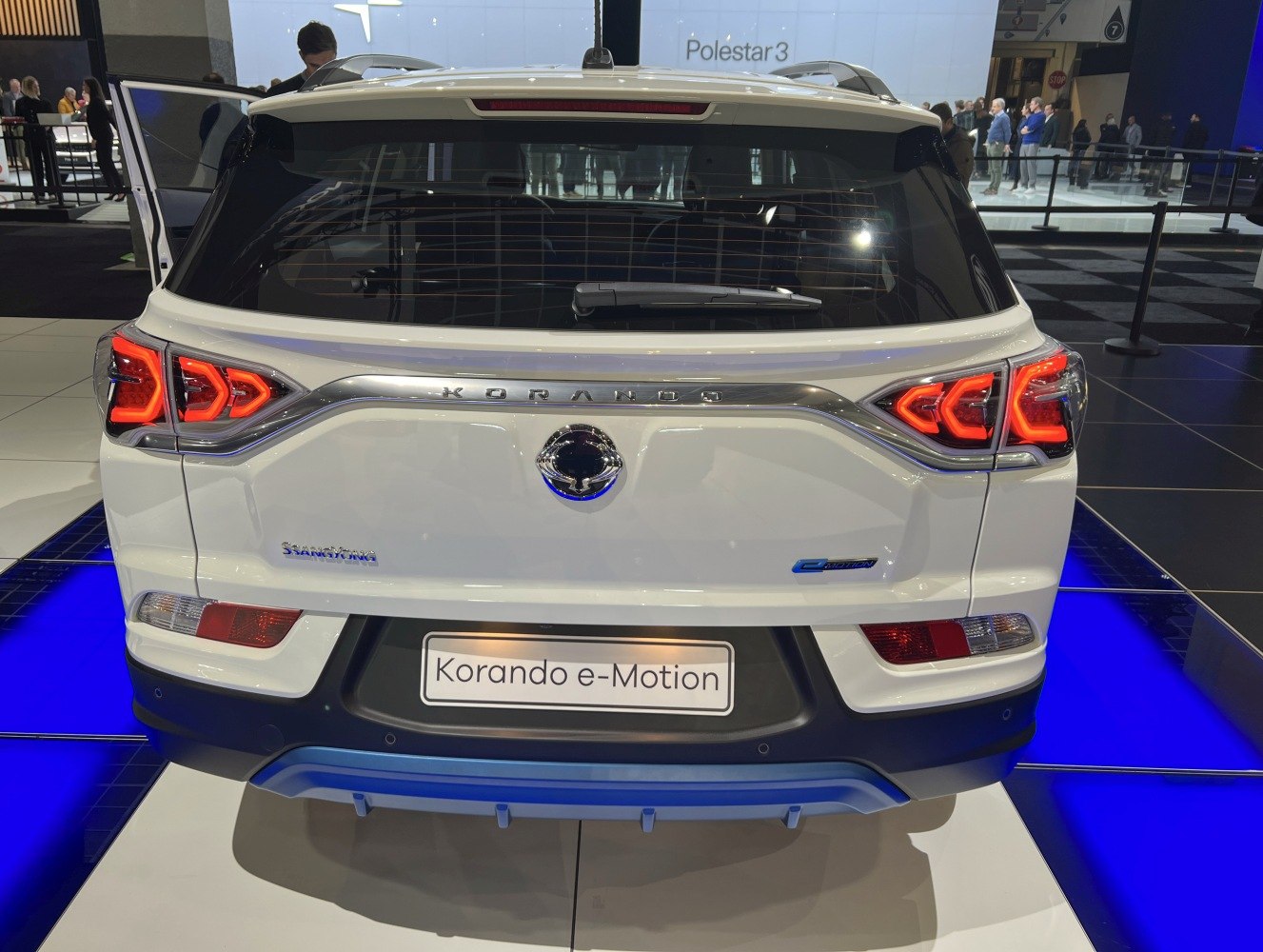 Rear view with LED tail lights and e-Motion badge on SUV