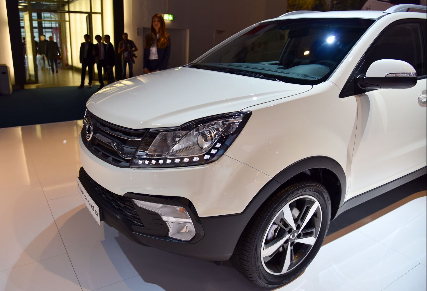 White SUV front with LED headlights and alloy wheels