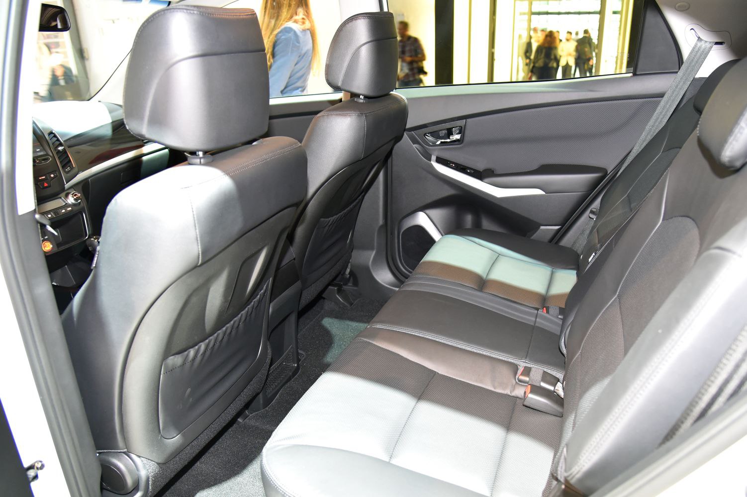 Spacious rear seating with leather upholstery and ergonomic design