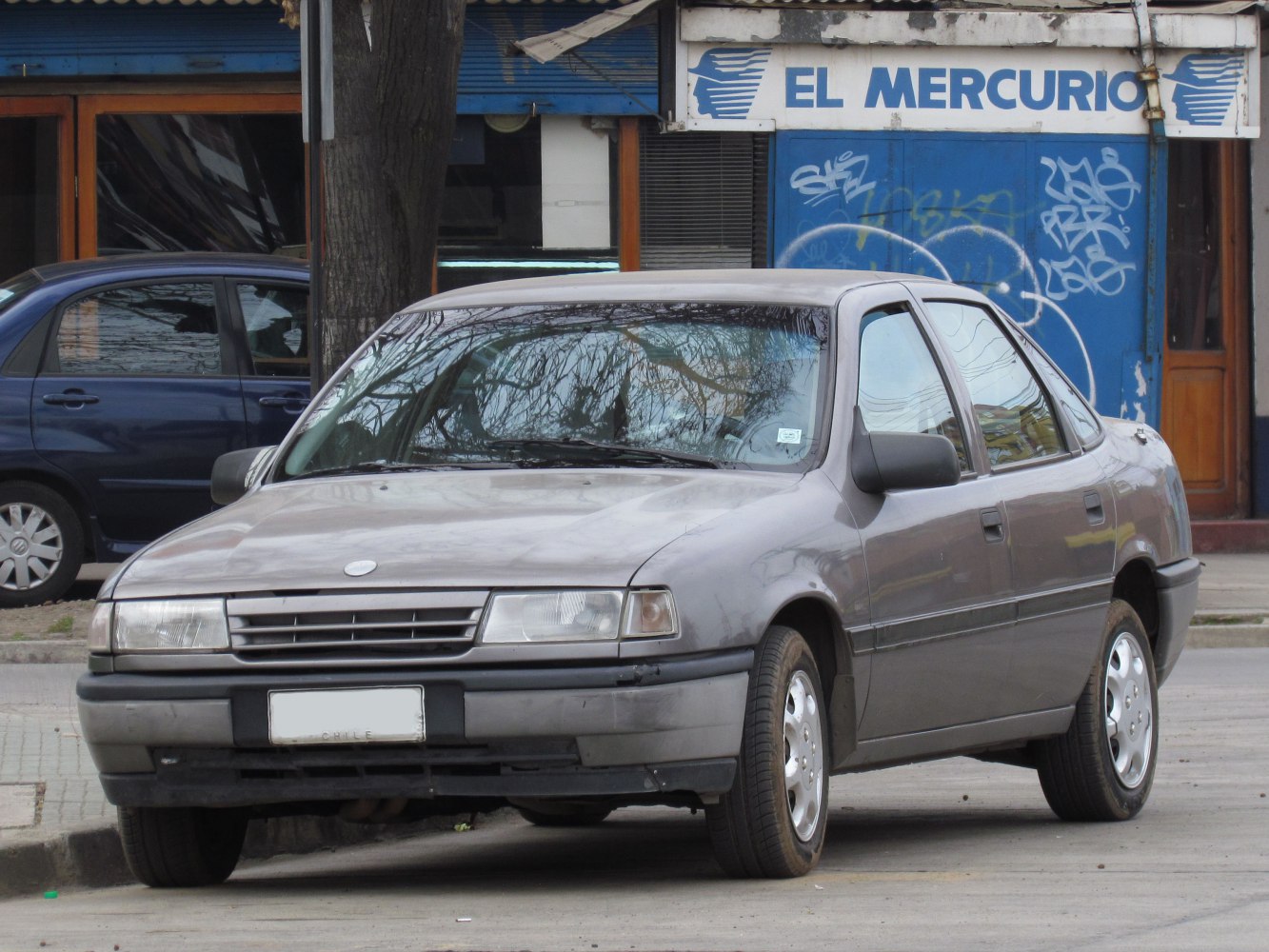 Front view with rectangular headlights and simple grille