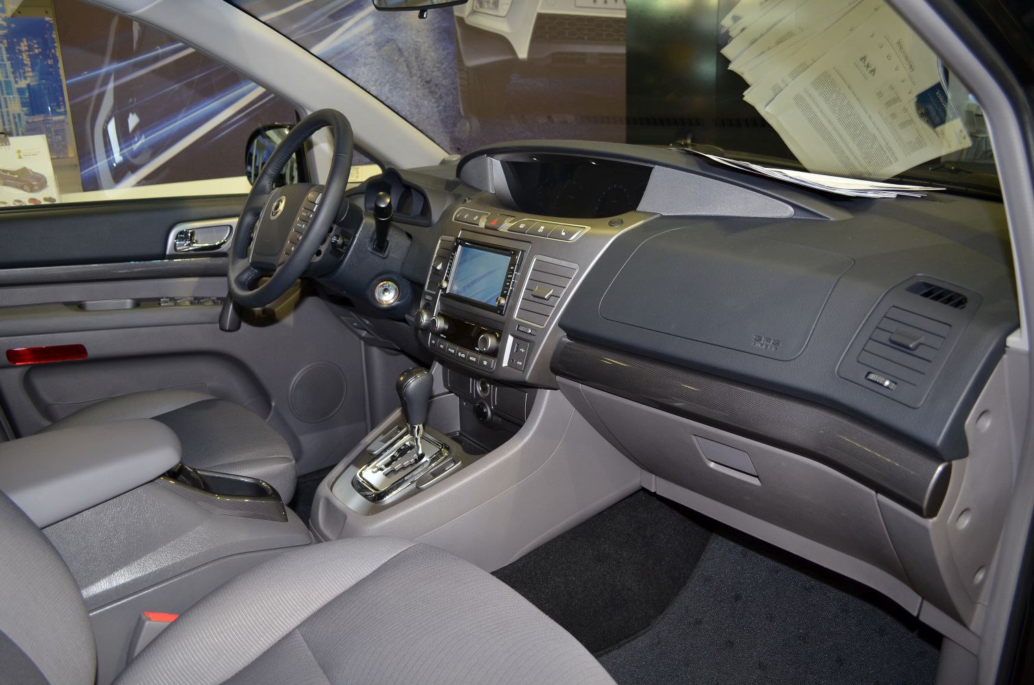 Dashboard, steering wheel, and central touchscreen infotainment system
