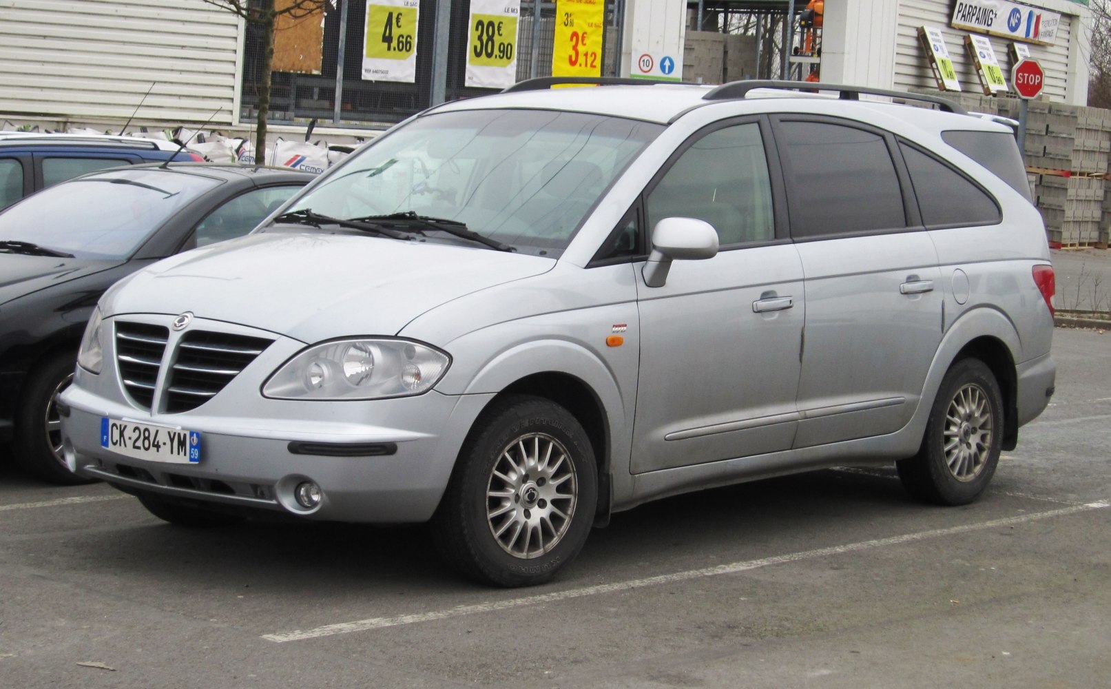 Silver five-door MPV with distinctive front grille and alloy wheels