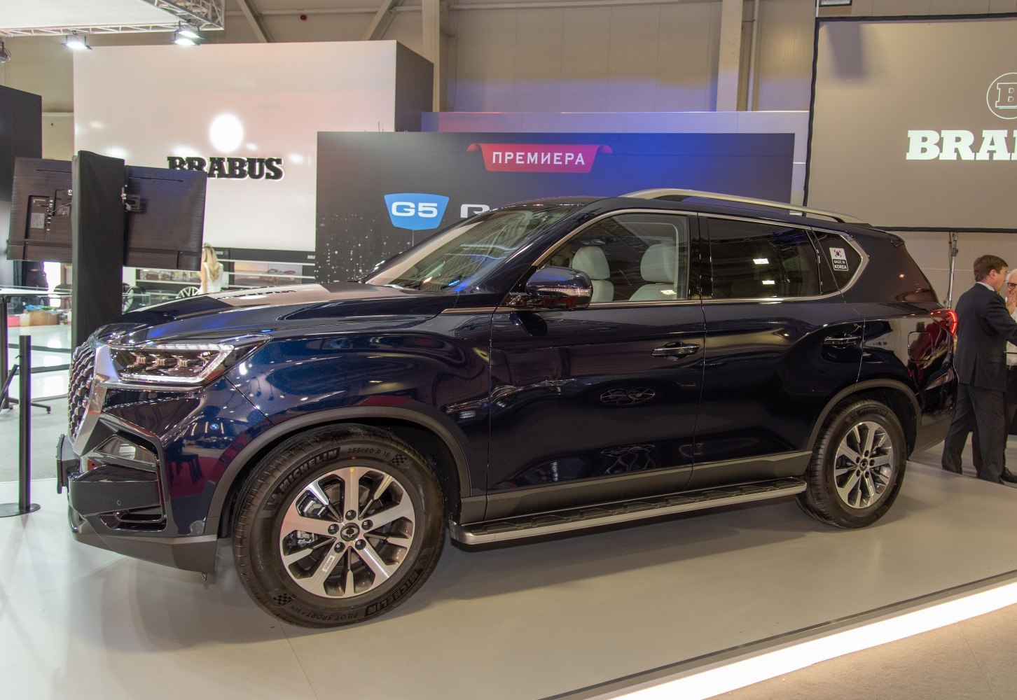 Modern SUV side view with LED headlights and alloy wheels