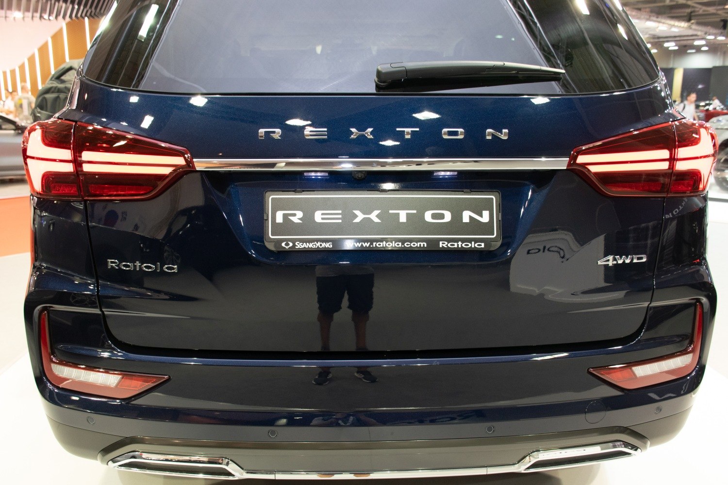 Rear end with LED taillights, chrome trim, and 4WD badge