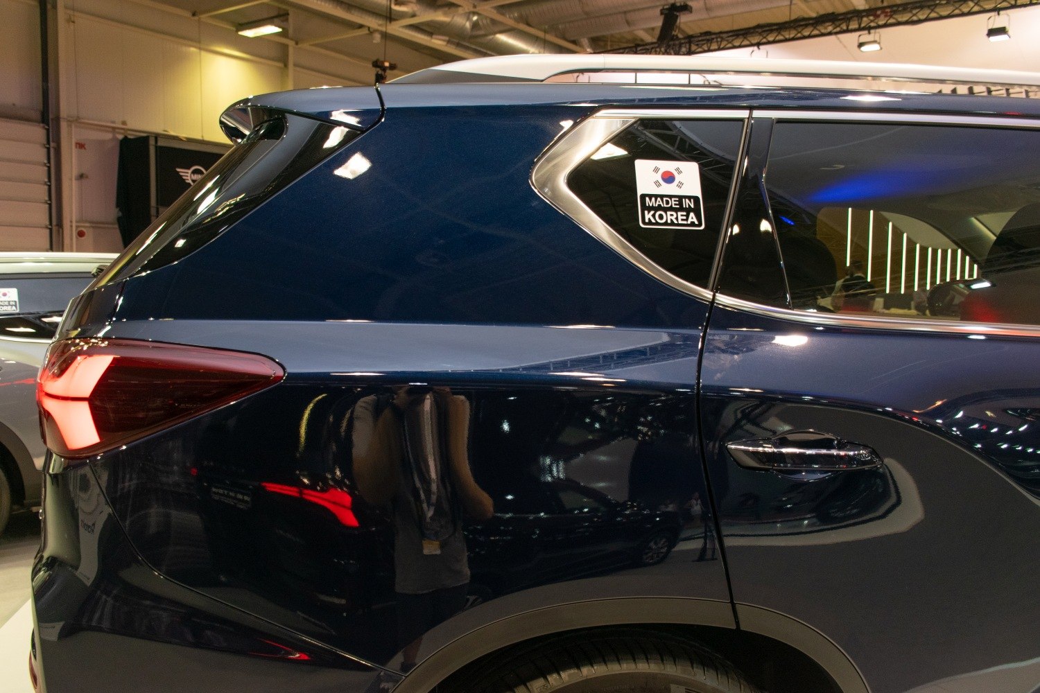 Rear side panel with LED tail light and window trim