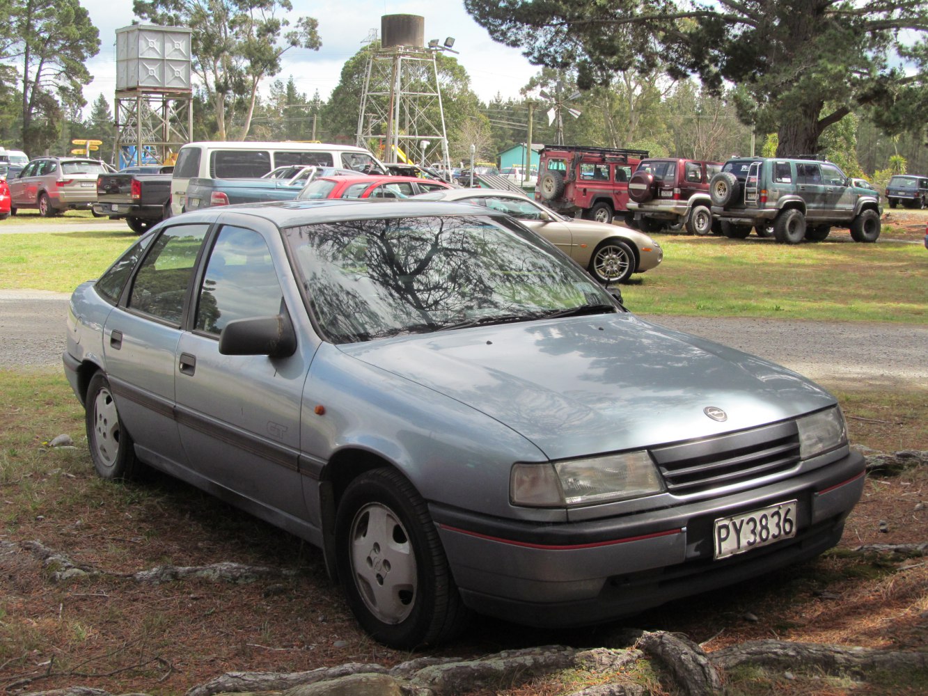 4-door sedan with alloy wheels in front quarter view