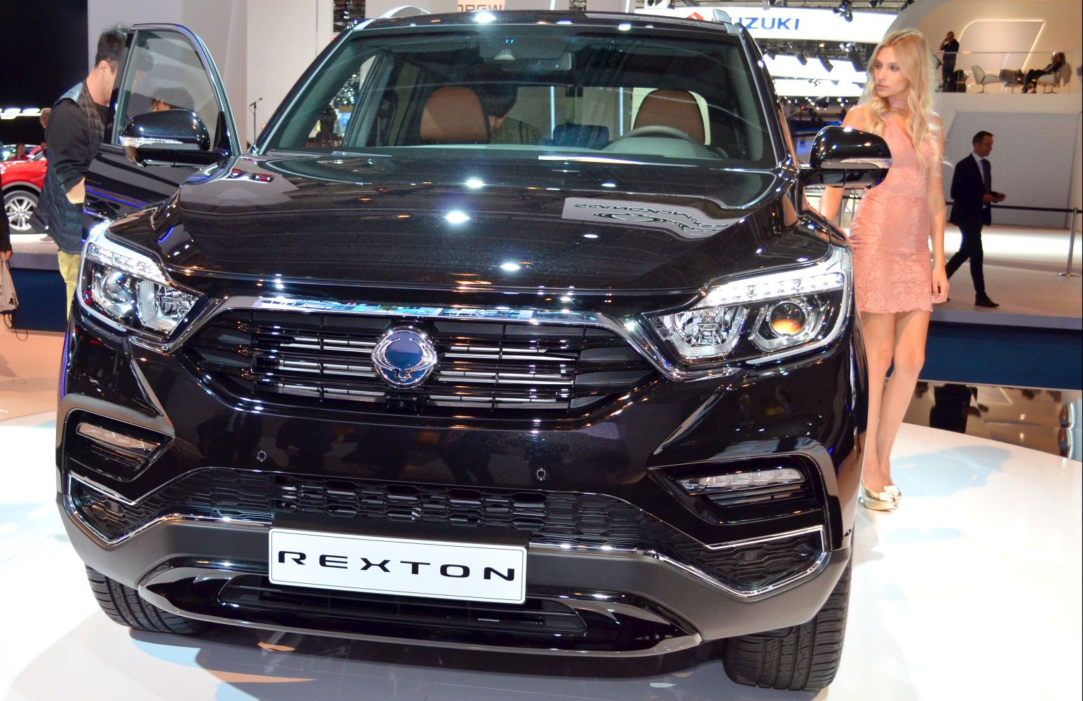 Front view with LED headlights and black grille of an SUV