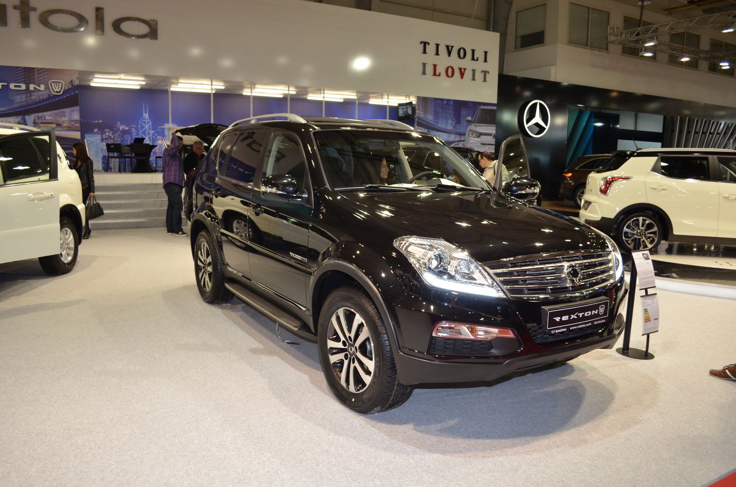 Front and side view of SUV with LED headlights and alloy wheels