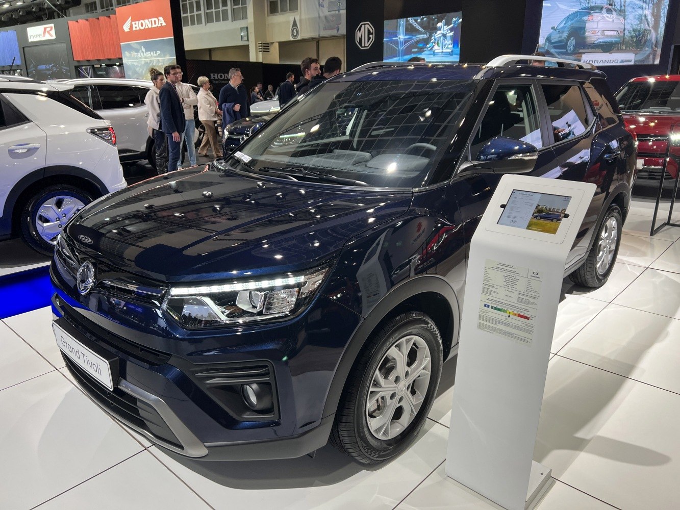 LED headlights and front exterior of an SUV in an auto exhibition