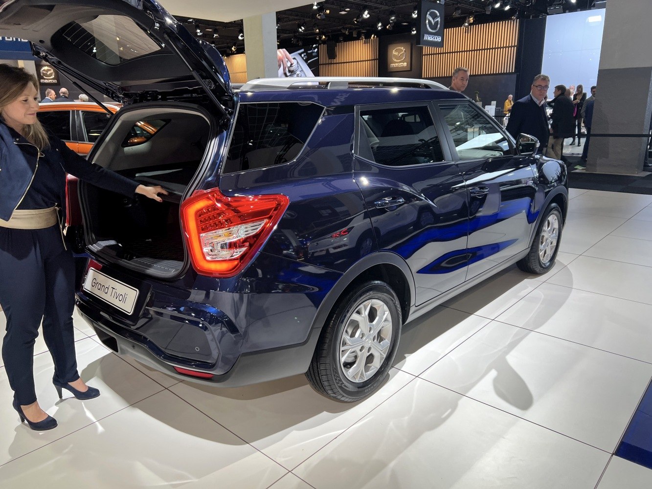 SUV rear with open cargo hatch, LED tail light design