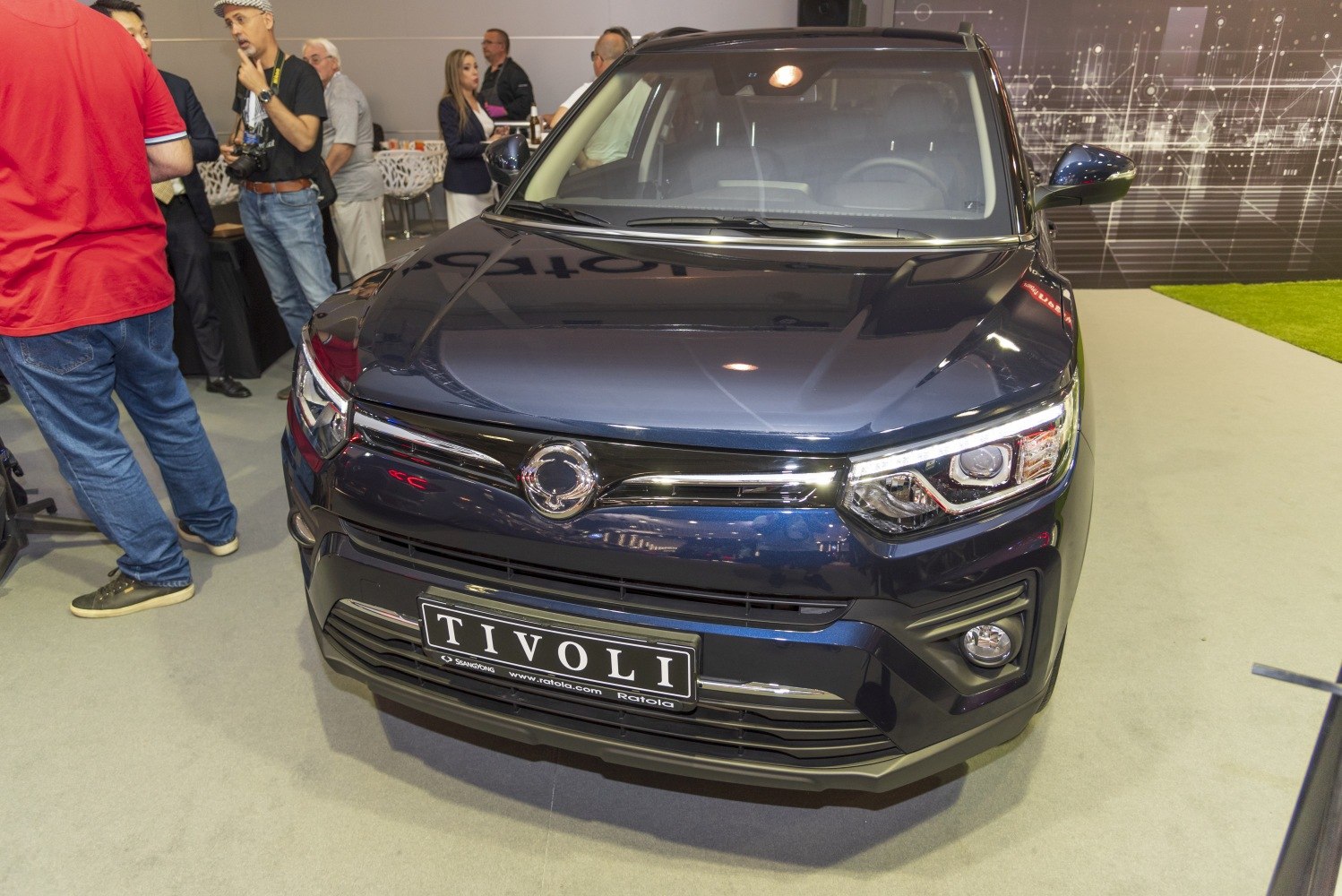 Front view of SUV with sleek grille and LED headlights