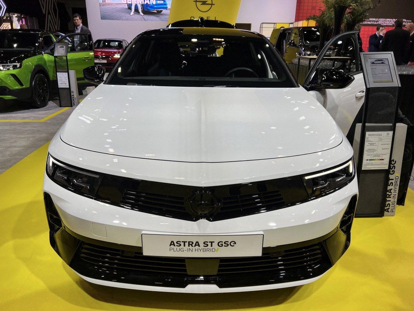 Front view of a plug-in hybrid sports tourer with LED headlights and sleek grille