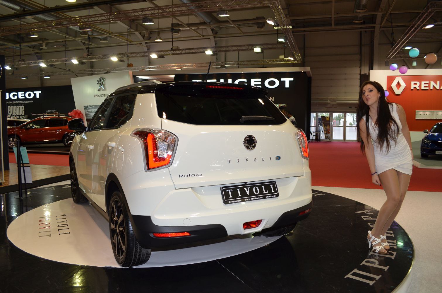 Rear view of a compact SUV with distinct tail lights and black roof