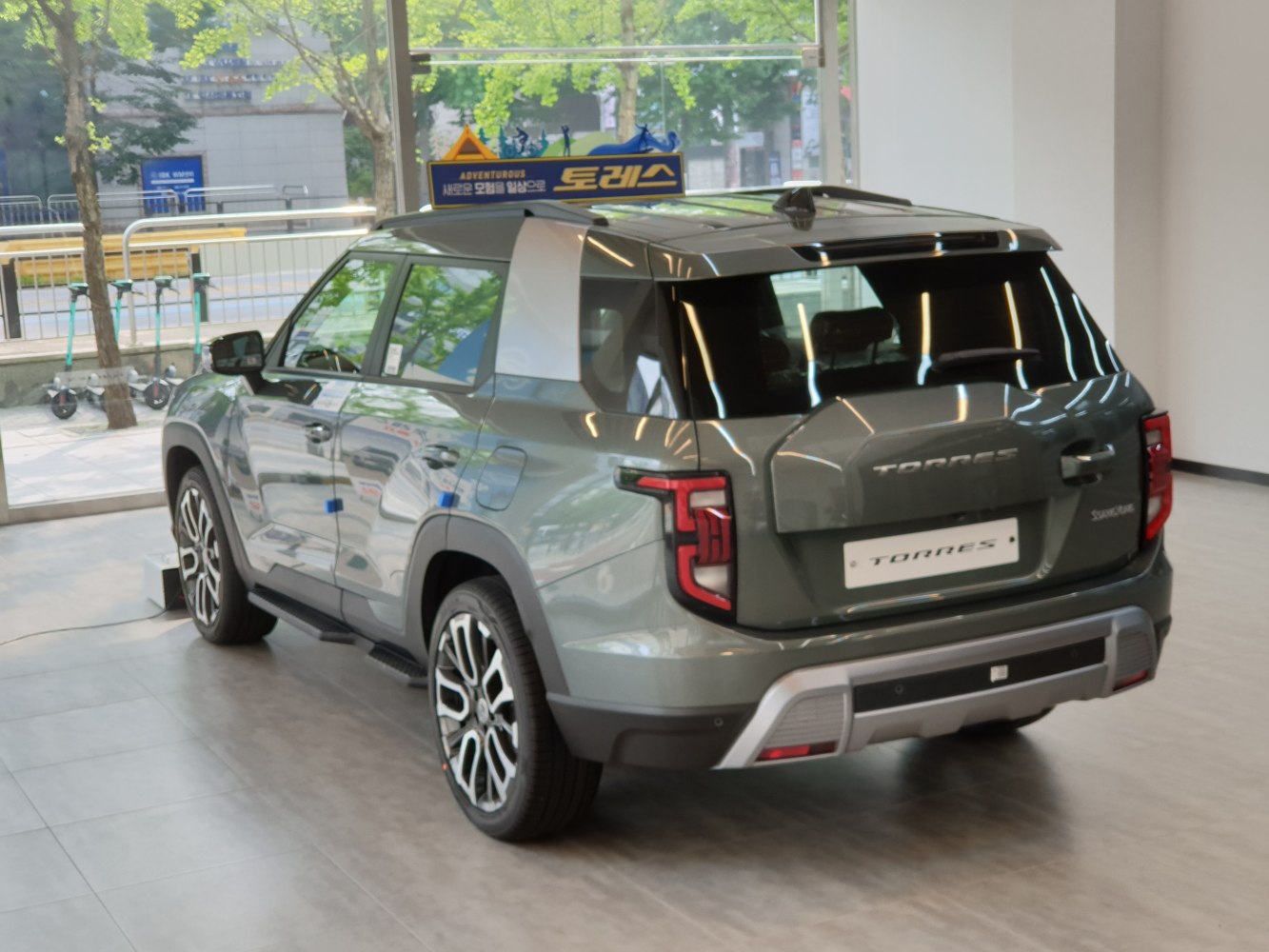 Rear view of SUV showing taillights, body shape, and wheel design