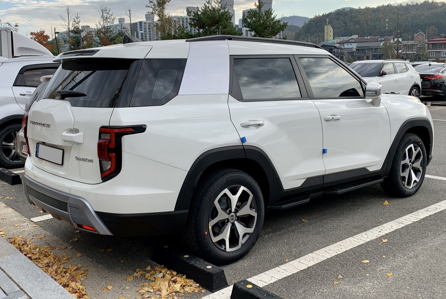 Rear and side view of SUV with bold taillights and modern alloy wheels