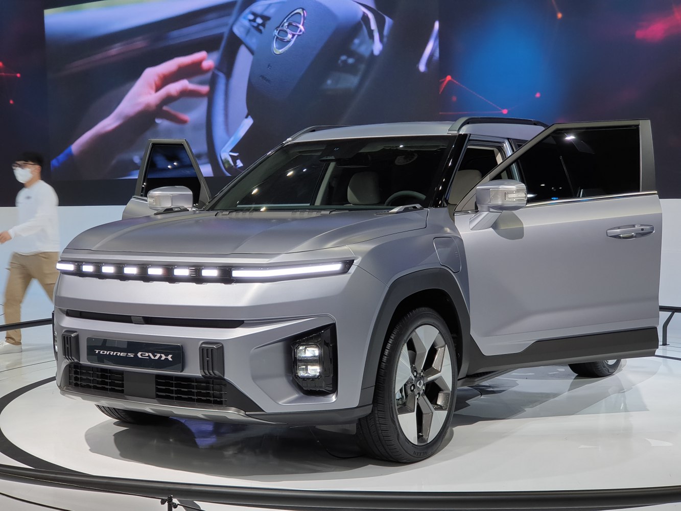 Futuristic front design with LED strip headlights and geometric alloy wheels