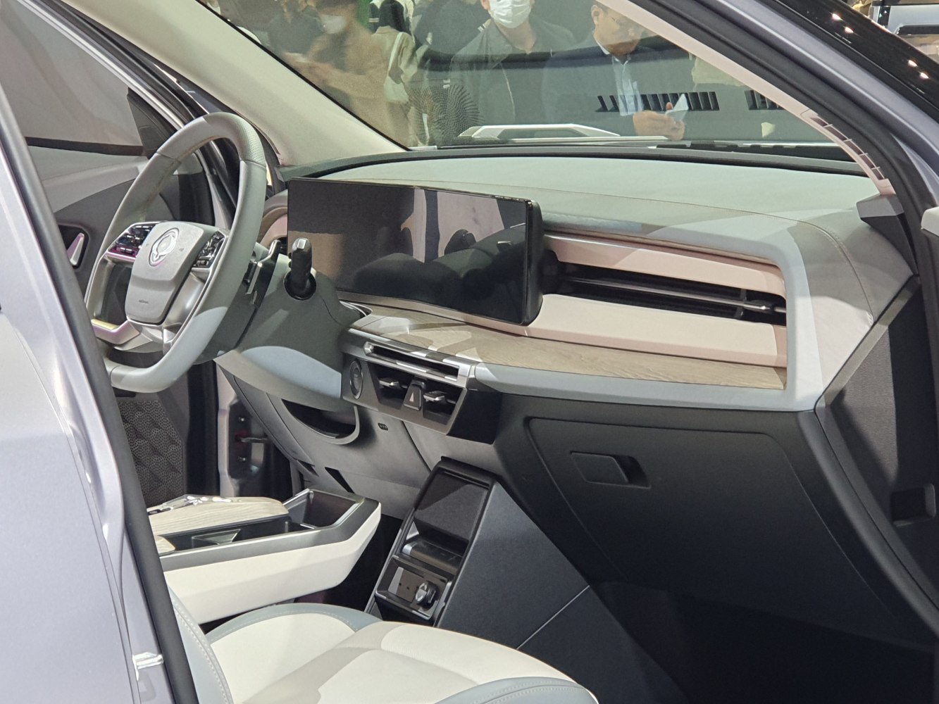 Modern car interior with digital dashboard and multifunction steering wheel