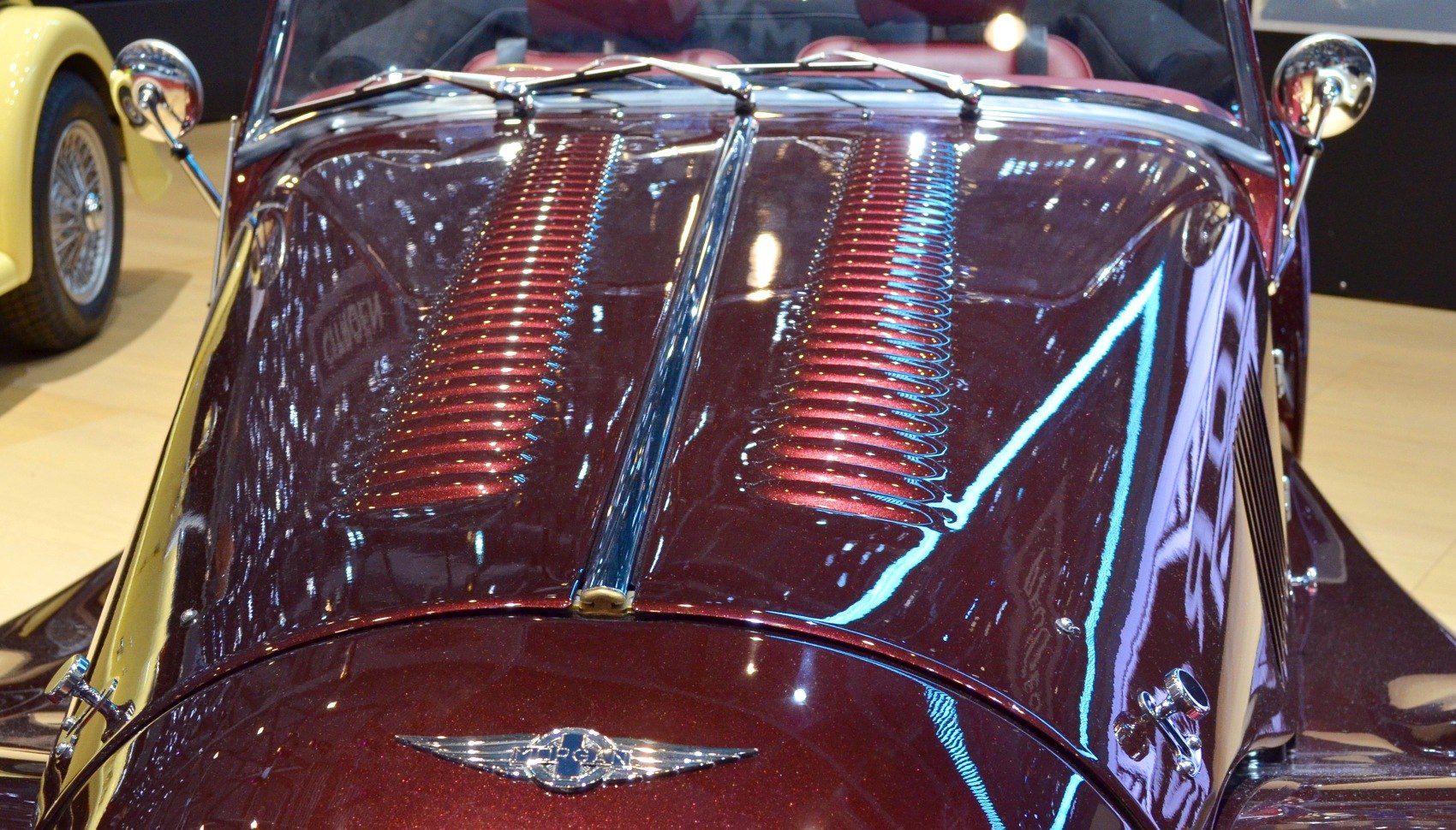 Classic car hood with dual ventilation vents and chrome accents