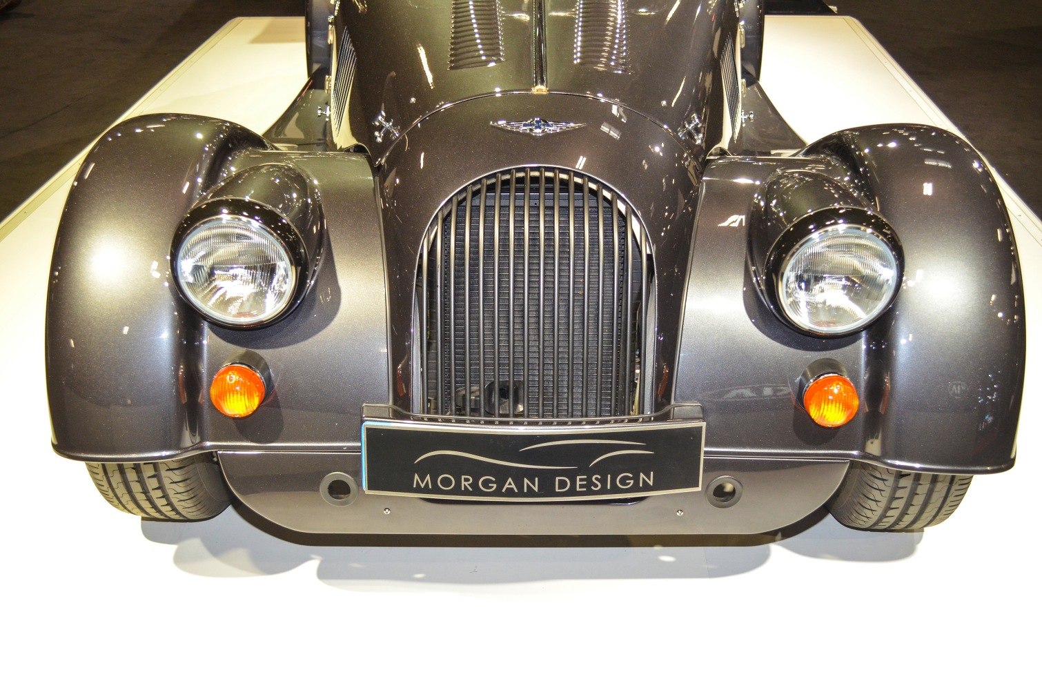 Vintage classic front with round headlights and vertical grille bars