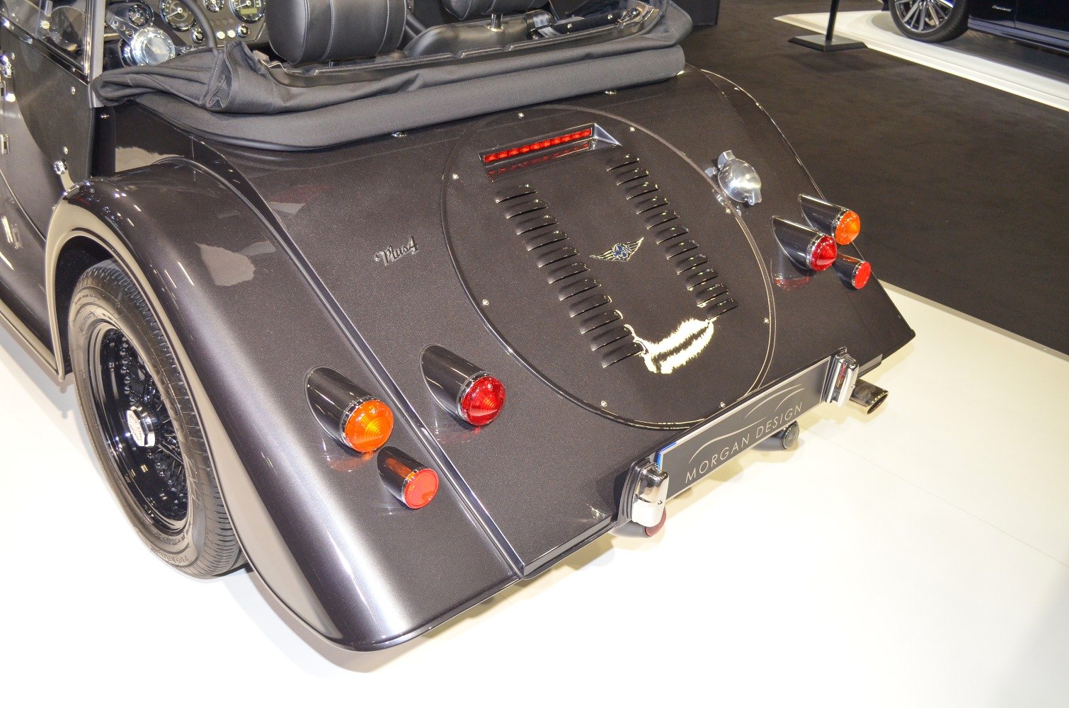 Classic rear with vintage tail light cluster and vented panel