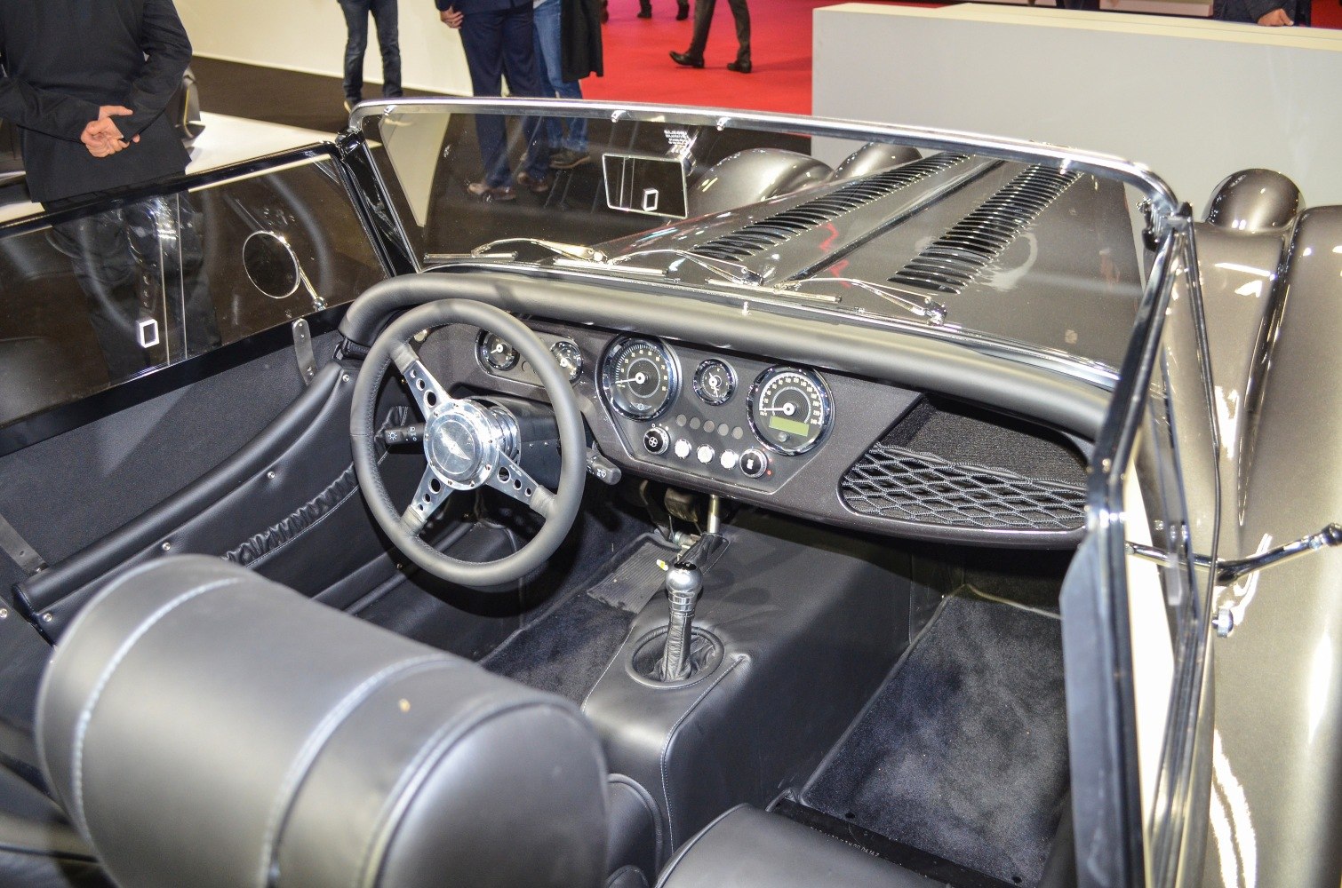 Vintage-style dashboard and cockpit with analog gauges and manual controls