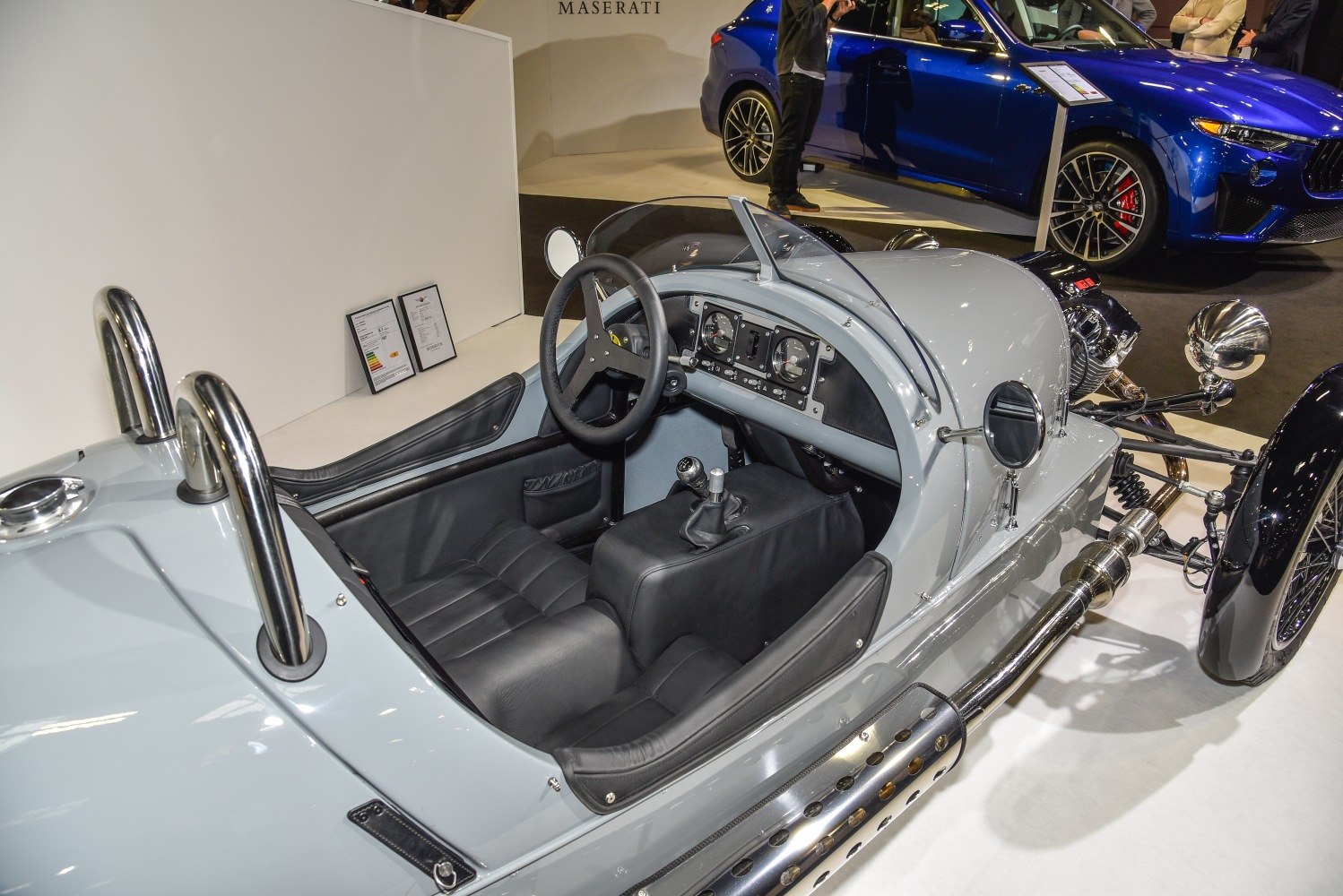 Open cockpit with vintage steering wheel and leather seats