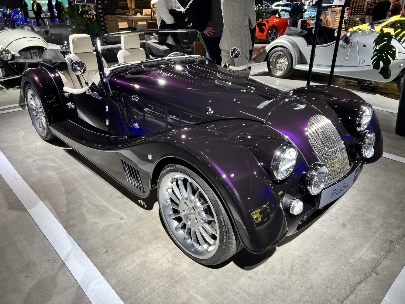 Classic retro roadster with distinctive grille and modern alloy wheels