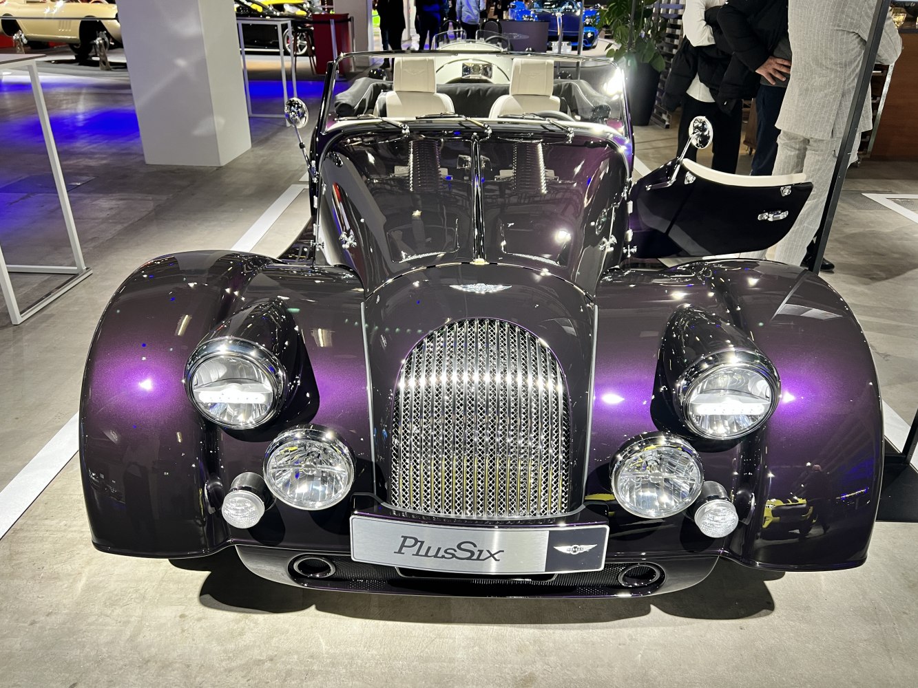 Front grille and dual headlights of a retro-style roadster