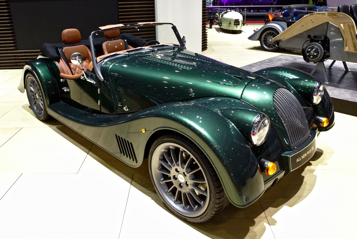 Retro convertible with classic front grille and modern alloy wheels