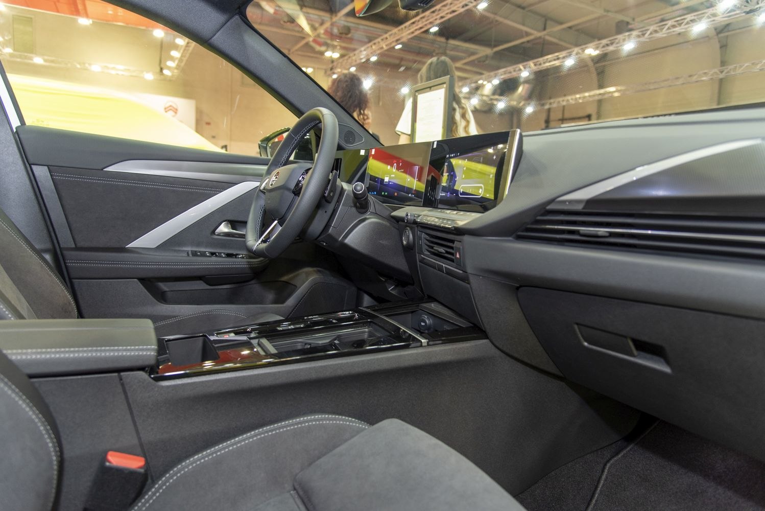 Interior featuring dual digital dashboard and modern controls