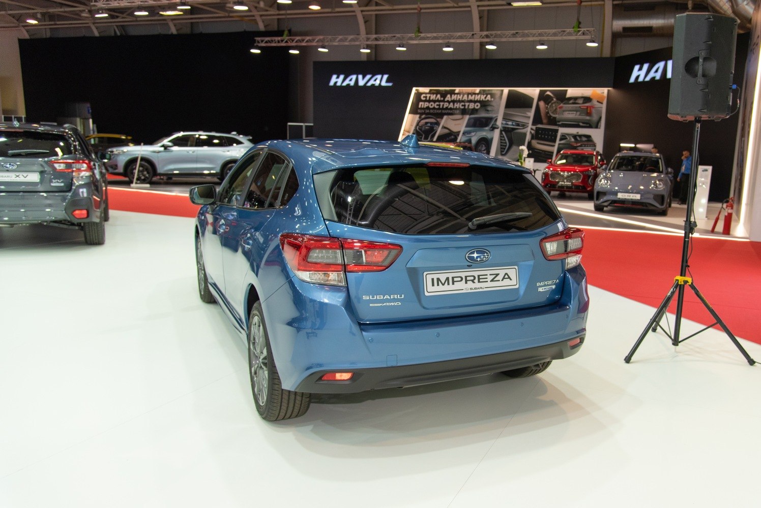 Rear hatchback view with LED tail lights and roof antenna