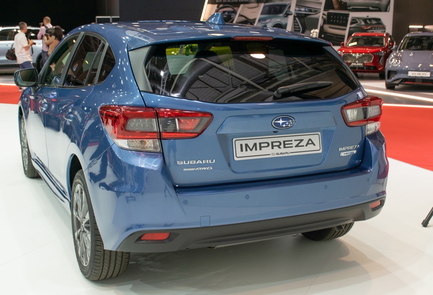 Rear view of a hatchback with distinctive taillights and AWD badge