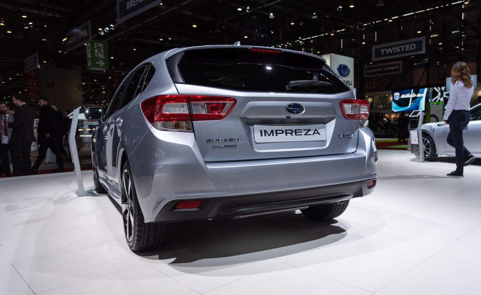 Rear view of hatchback with distinct taillights and rear windshield wiper